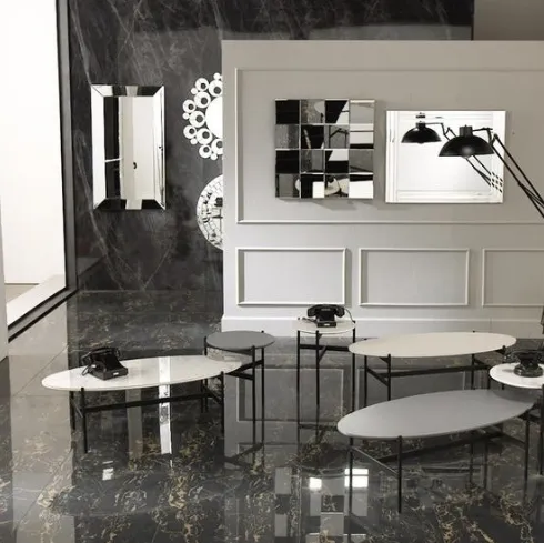 Tavolino rotondo Thor con top in ceramica con fondo in MDF e struttura in metallo verniciato di Stones