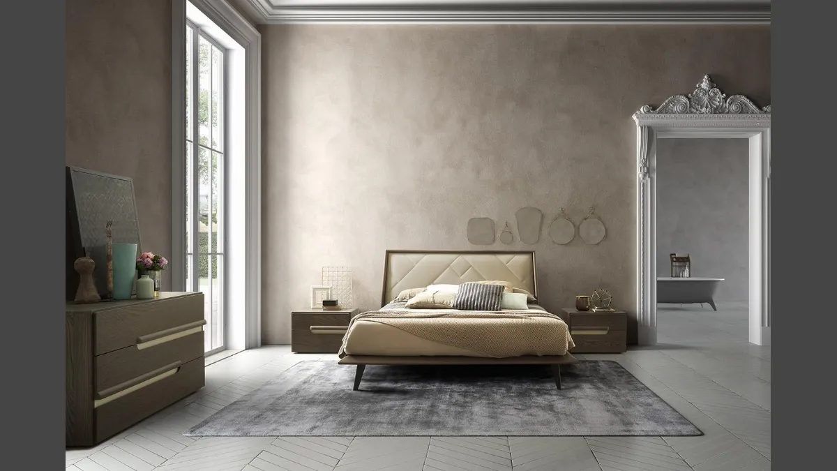 Letto in legno Cliff con testiera rivestita in pelle trapuntata di Mobilgam